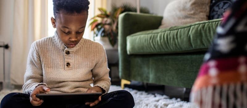 Child using his tablet