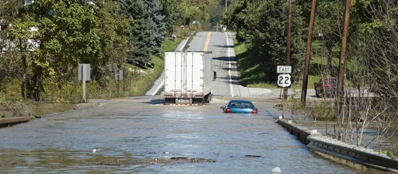 Car flooded on the side of the road