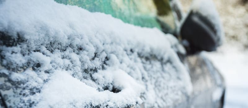 Frozen car in the snow