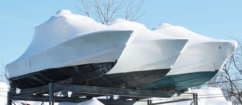 Covered boats in dry dock